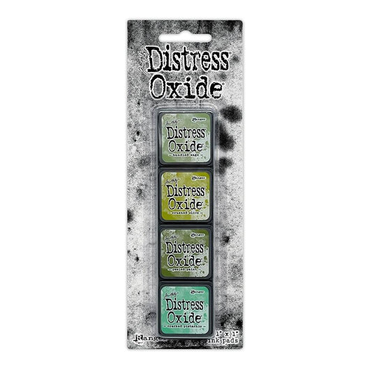 Distress Oxide Mini Ink Pads Kit 3   This kit includes: Bundled Sage, Crushed Olive, Peeled Paint, Cracked Pistachio.